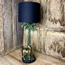 Lampe vintage,  Hollywood Regency, design Italien des années 70, résine au décors d'un zèbre et d'un palmier. Par Fascinato Milan.                                  Vintage lamp, Hollywood Regency, Italian design from the 70s, resin with zebra and palm tree decorations. By Fascinato Milan.