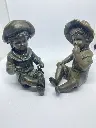Couple de Putis, chérubins en bronze, époque fin XIXème, signés Claude. Très belle patine et mesurant 10cm de haut environ pour 8 de profondeur.            Pair of Putis, bronze cherubs, late 19th century, signed Claude. Very beautiful patina and measuring approximately 10cm high and 8cm deep.